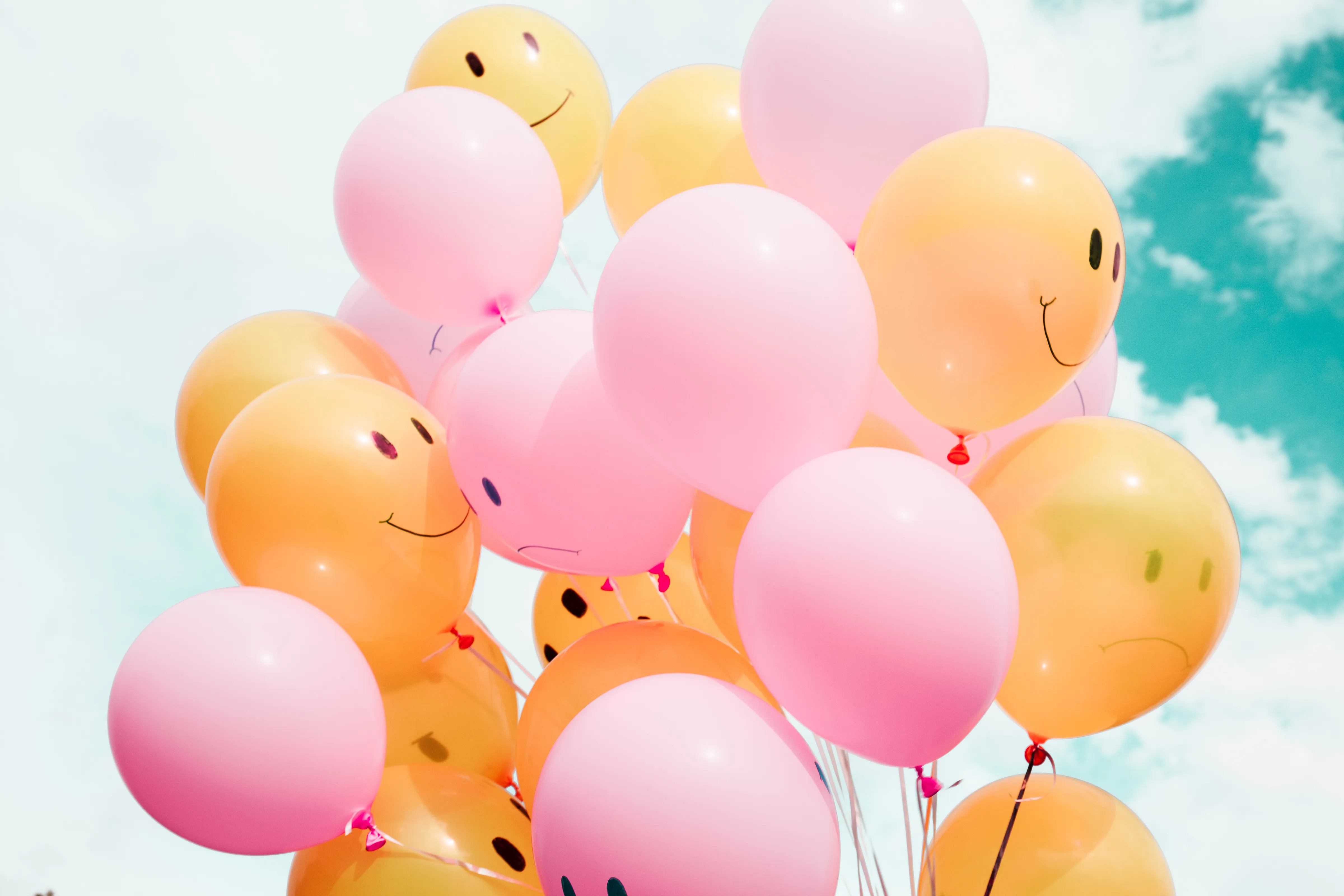 ballons with smiley faces